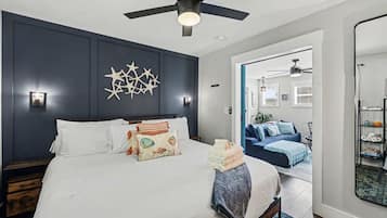 1 bedroom, desk, iron/ironing board, travel crib
