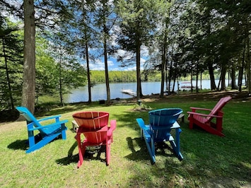 Gradual sloped yard overlooks 100ft of private waterfront.  