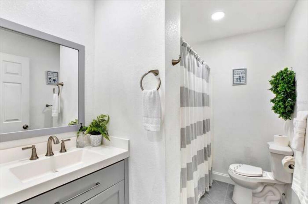 Combined shower/tub, hair dryer, towels, toilet paper