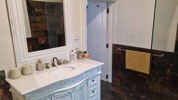 Deluxe House, 2 Bedrooms | Bathroom | Separate bathtub and shower, deep-soaking bathtub, rainfall showerhead