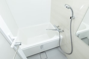 Combined shower/tub, free toiletries, hair dryer, electronic bidet