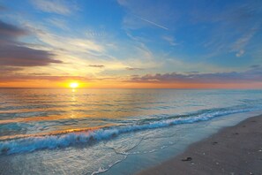 On the beach, sun-loungers, beach towels