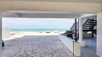 On the beach, sun loungers, beach towels