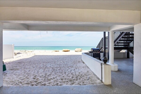 On the beach, sun-loungers, beach towels