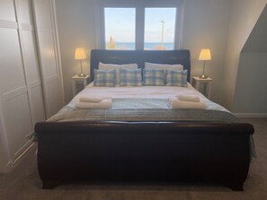 4 bedrooms, blackout drapes, iron/ironing board, WiFi