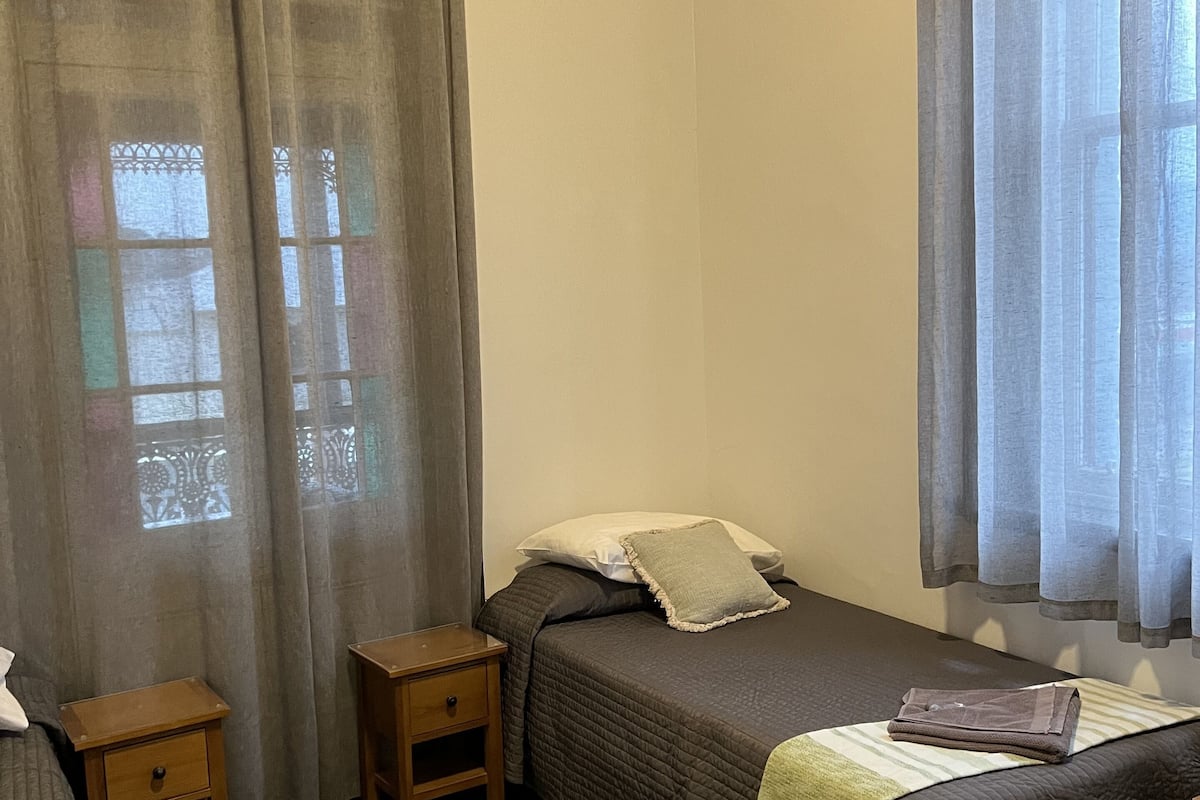 economy twin room | 1 bedroom, premium bedding, blackout curtains, bed sheets
