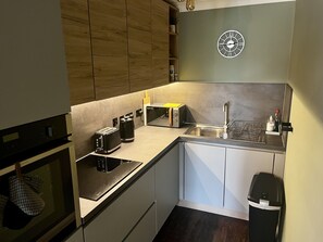 Oven, stovetop, dining tables