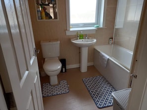 Apartment, Multiple Beds | Bathroom | Combined shower/tub, deep soaking tub, hair dryer, towels