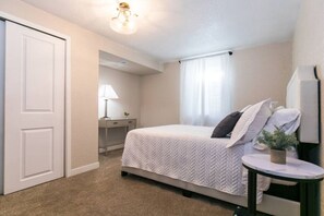 2 bedrooms, desk, blackout curtains, iron/ironing board