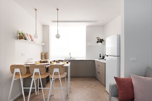 Apartment | Private kitchen | Full-sized fridge, microwave, oven, stovetop - Cozy Sanctuary with a Modern Twist by Sea N Rent (Tel Aviv)