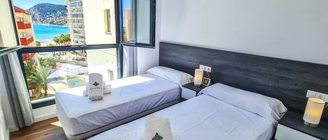 2 dormitorios, tabla de planchar con plancha, wifi gratis y ropa de cama