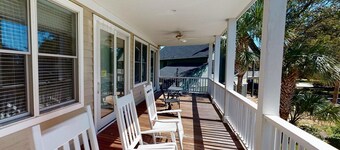 Spacious 3 story near beach home, stunning porches, and reverse floor plan