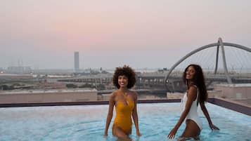 Outdoor pool, pool umbrellas, pool loungers