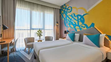 Standard tvåbäddsrum | Sängtillbehör av högsta kvalitet och värdeförvaringsskåp på rummet