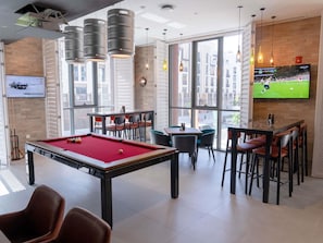 2 bars/lounges, sports bar, rooftop bar