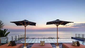 Outdoor pool, open 6:30 AM to 8:00 PM, pool umbrellas, pool loungers