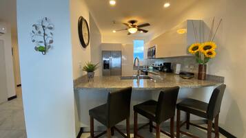 Coffee/tea maker, fridge, microwave, oven