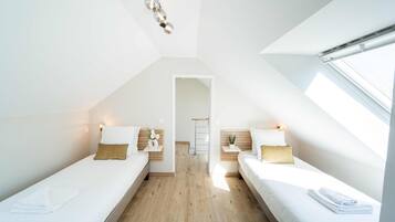 Deluxe suite | 1 slaapkamer, verduisterende gordijnen, een strijkplank/strijkijzer