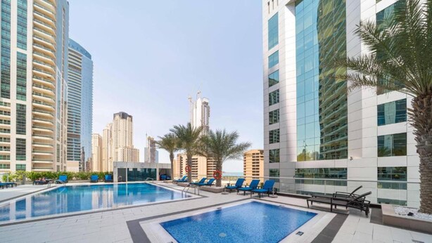 Outdoor pool - Maison Privee - Modern Apt in JBR w/ Amazing Sea Views (Dubai)