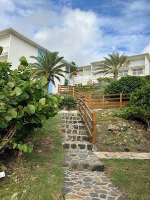 Property grounds - Studio Ocean Sunrise, breathtaking sea view, swimming pool on Orient Bay beach (Cul-de-Sac)