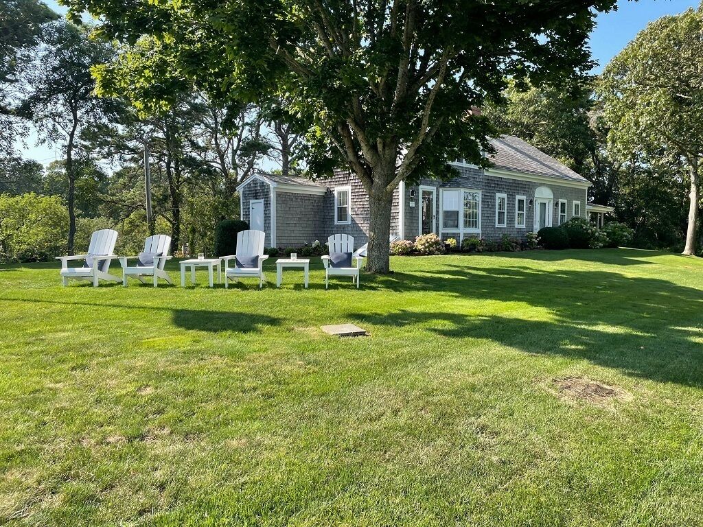 Charming and updated home with private gardens and patio!