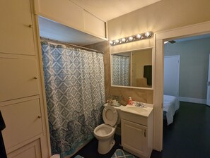 Combined shower/bathtub, hair dryer, towels, soap
