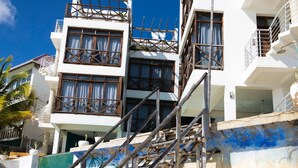 A multi-story building with a staircase leading to an upper level. - ZAN Tropical Jambiani Beach (Jambiani)