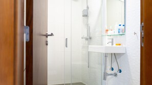 Bathtub, hair dryer, towels
