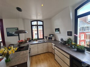 Elite Apartment, Ensuite, City View (Le phare Dieppois) | Shared kitchen | High chair - Le Phare Dieppois by JPS Holiday - Chaleureux Appartement au Cœur de Dieppe (Dieppe)