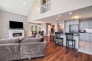 Smart TV, fireplace, books