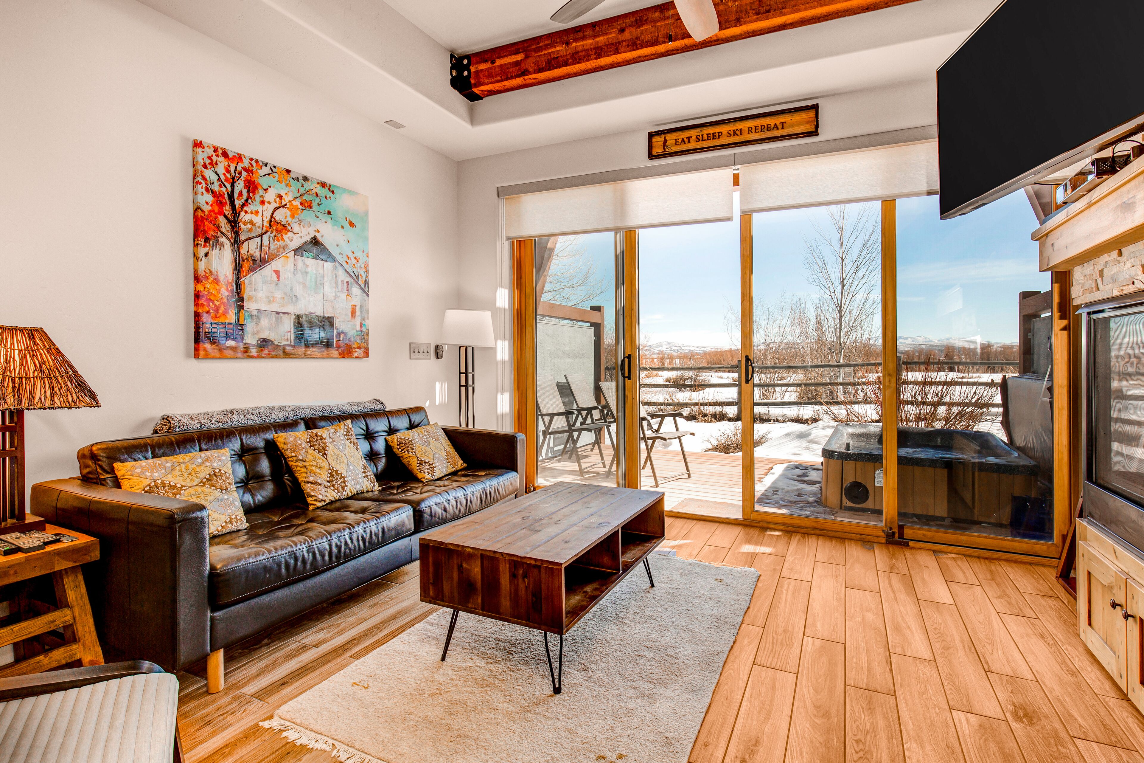 Luxury living & mountain views with private hot tub, dual suites, & fireplace