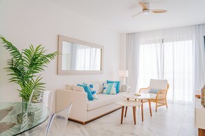 Exclusive Penthouse, 2 Bedrooms, Hot Tub, Pool View | Living room | 42-inch Smart TV with cable channels, TV - Xeliter Cana Rock Punta Cana (Punta Cana)