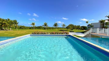 Outdoor pool, open 7:00 AM to 7:00 PM, pool umbrellas, pool loungers