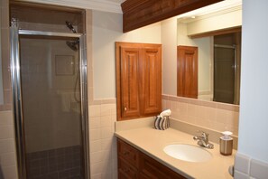 Combined shower/tub, hair dryer, towels, soap