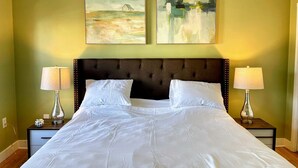A large bed with white linens, two bedside lamps, and two paintings on the wall. - MODERN MASSIVE LARGE GROUP 3800sf MIT HARVARD BOS (Somerville)
