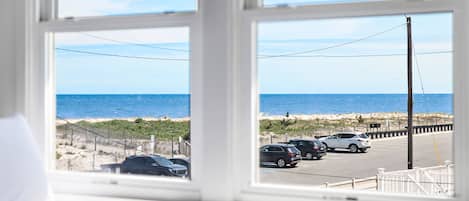 Deluxe Queen with Ocean View | Premium bedding, memory foam beds, free WiFi, bed sheets