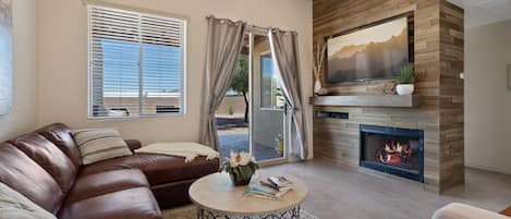 Smart TV, fireplace, books