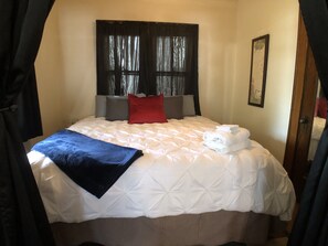 4 bedrooms, desk, blackout drapes, iron/ironing board