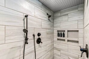 Combined shower/tub, hair dryer, towels, soap