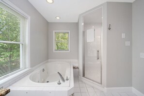 Bathtub, hair dryer, towels, soap