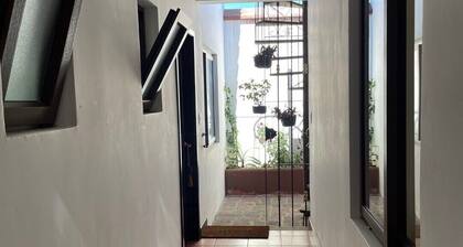 COZY COLONIAL TWO-BEDROOM FAMILY HOME WITH BEAUTIFUL TERRACE WITH VOLCANOES VIEW