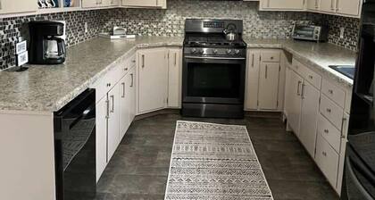Spacious 4 BR 2BA Home with Bar and Fenced Yard