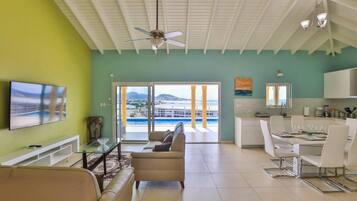 Villa | Living area | 30-inch TV with cable channels