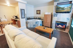 TV, fireplace, DVD player, video library - Jetted Tub Suite with River View from Patio (Estes Park)
