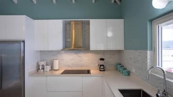 Villa | Private kitchen | Fridge, microwave, oven, stovetop
