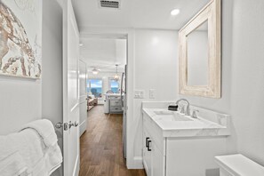 Combined shower/bathtub, hair dryer, towels, soap