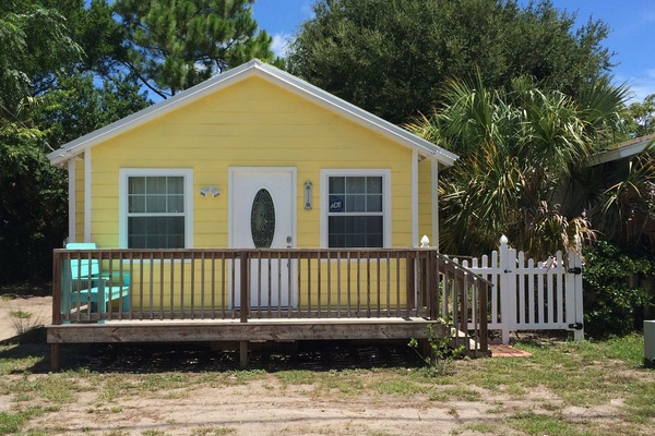 Front of property with parking space in front.