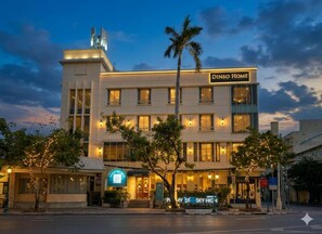 A hotel named DINSO HOME with a modern facade, multiple windows, and a sign indicating a restaurant on the ground floor. - Collection O Dinso Home Boutique (Bangkok)