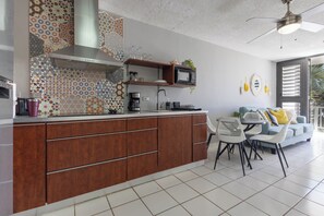 Fridge, microwave, stovetop, coffee/tea maker