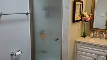 Shower, towels, soap, shampoo